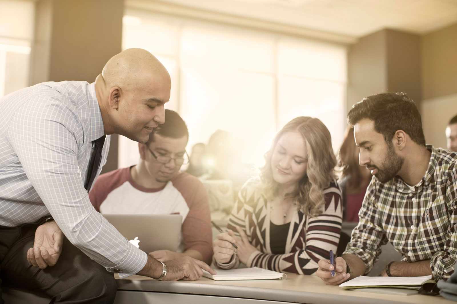 Teacher helping students 