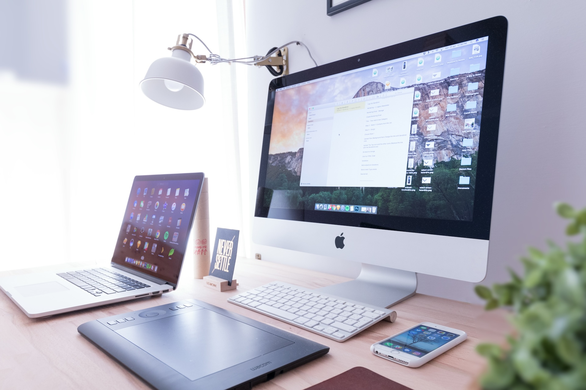 Mac computer next to an iphone