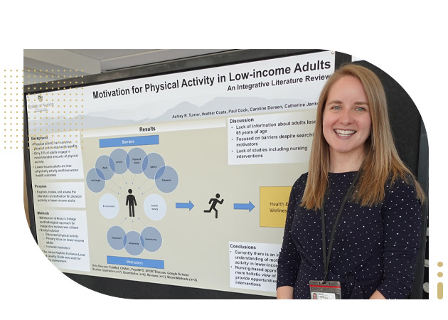 Student nurse in front of poster presentation