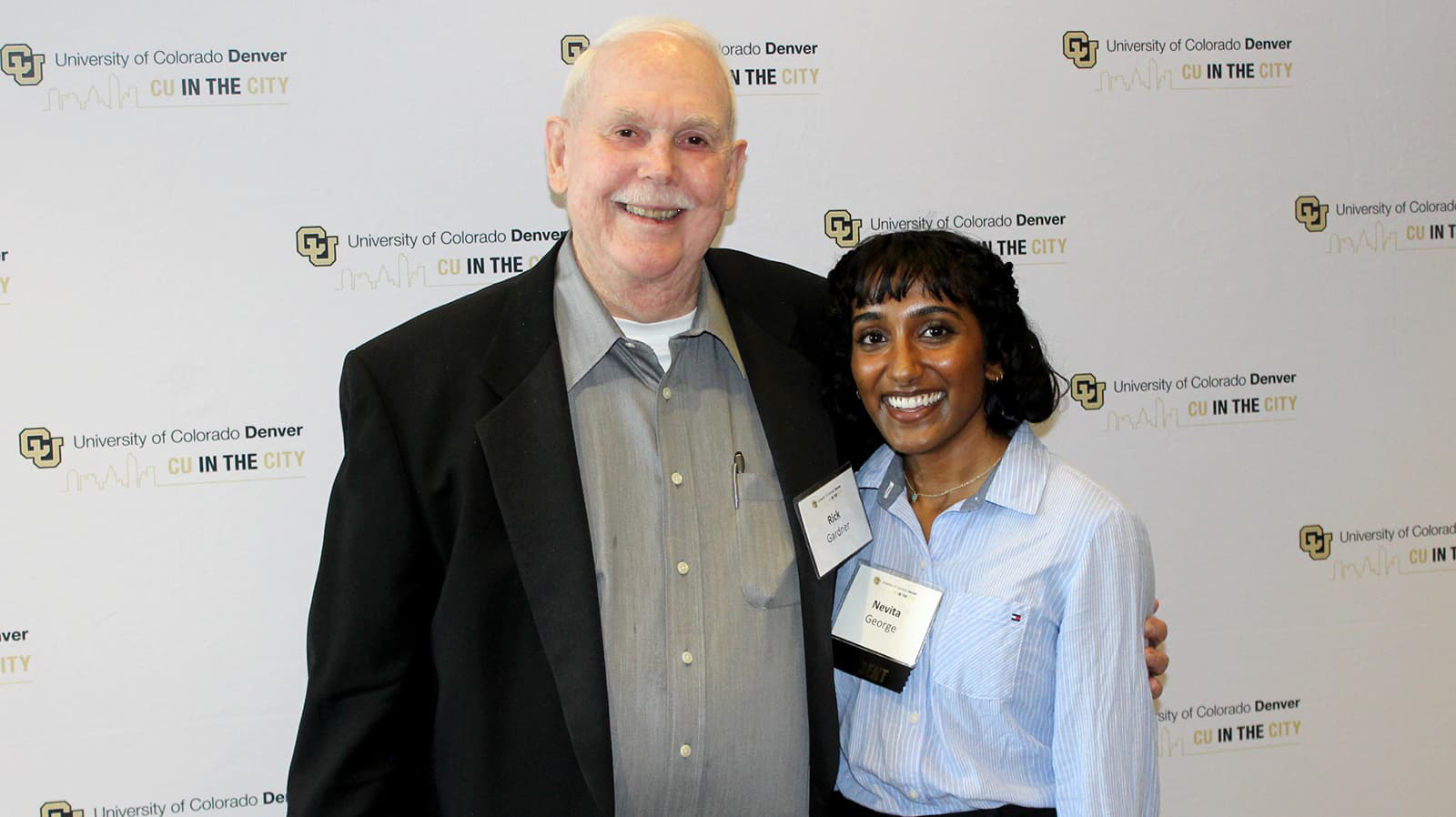 Student Nevita George with scholarship donor Rick Gardner