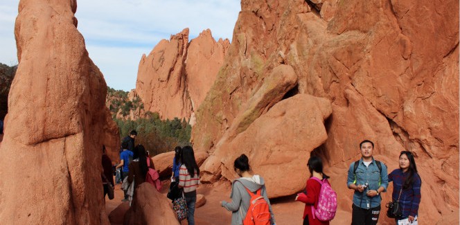 students hiking through Rock Ledge Ranch Historic site