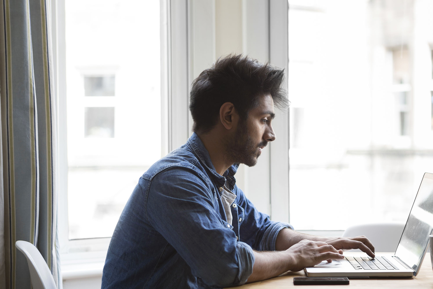 scholar-working-on-laptop