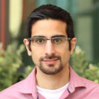 Close-up headshot of Mazen Al Borno in business casual shirt