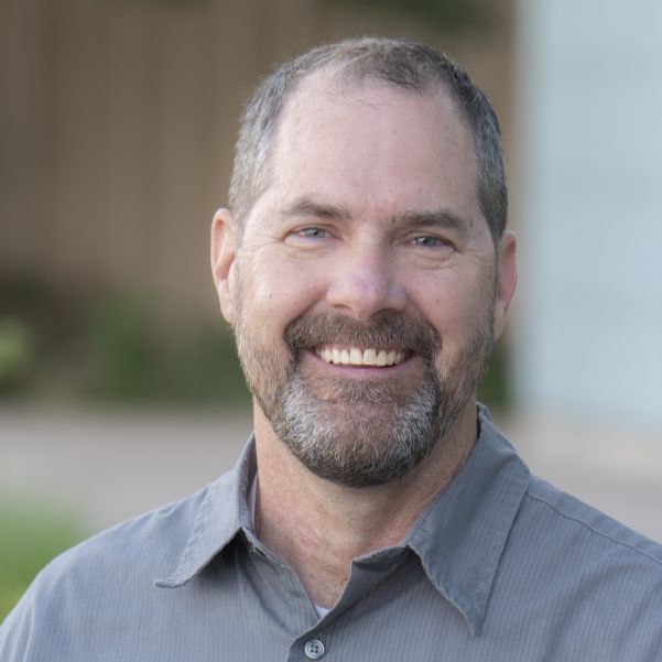 Headshot of Jim Sandstrum from the shoulders up in business shirt