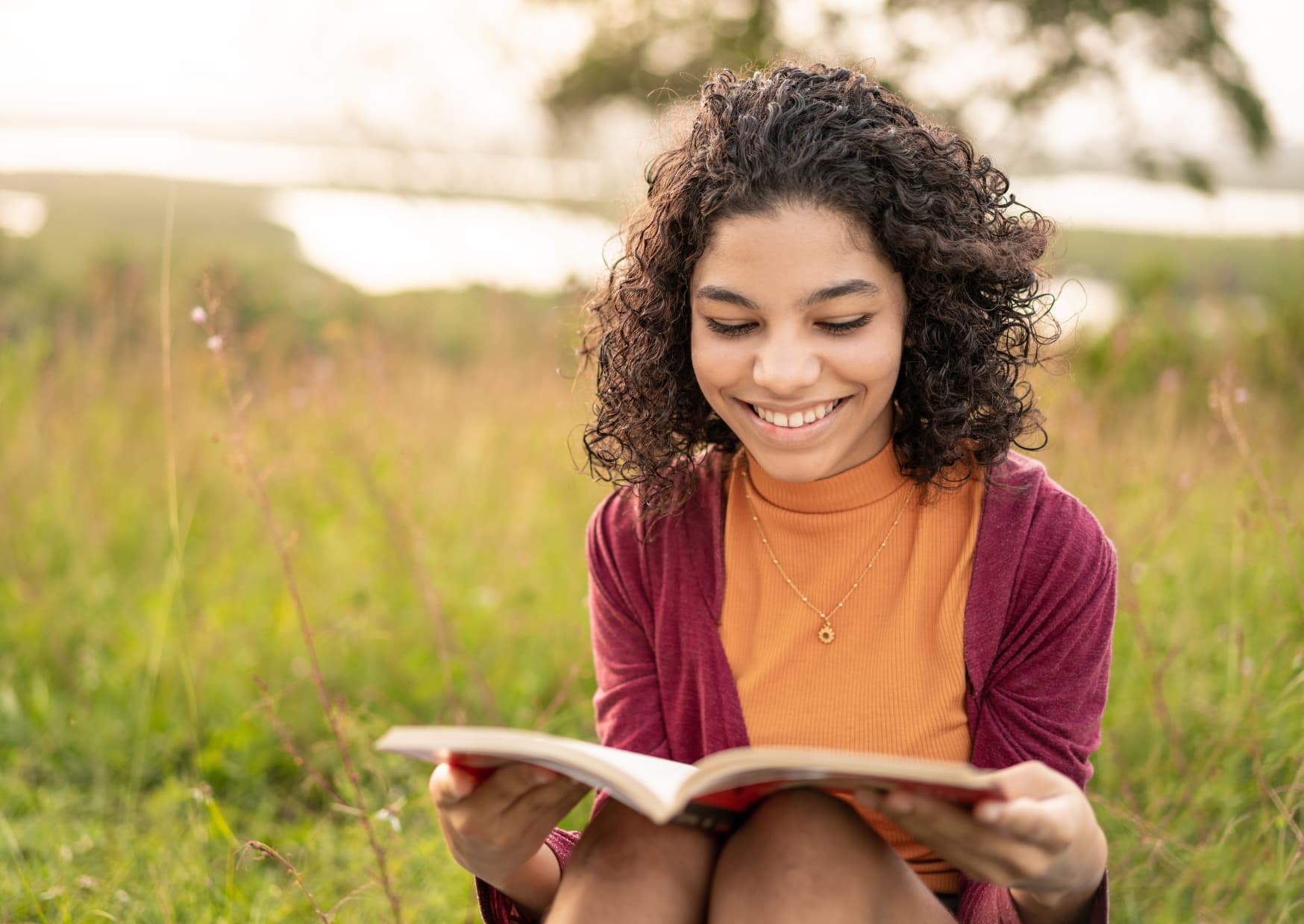 Girl reading outdoors