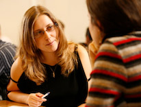 People talking at desk