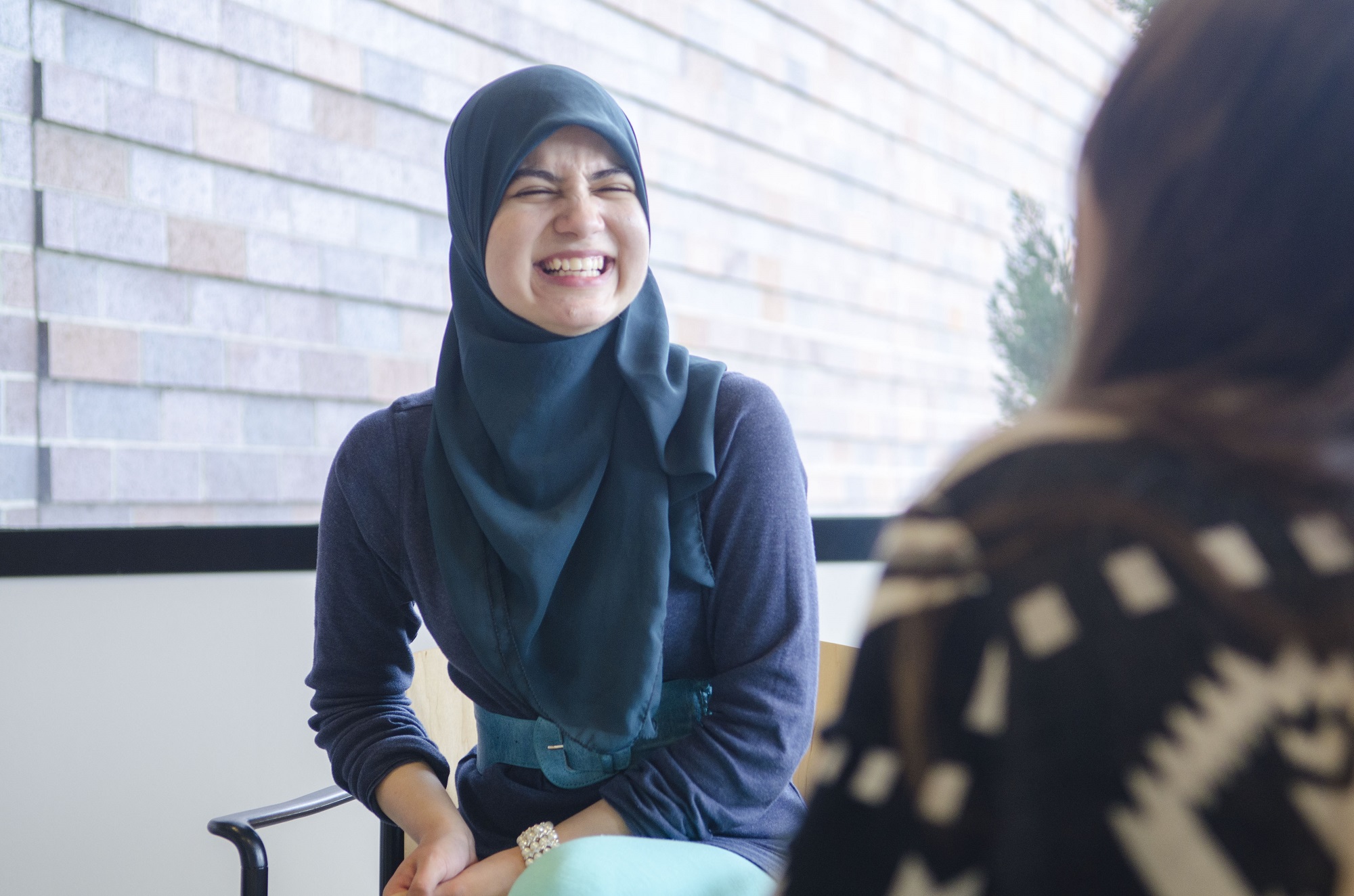 Student smiling and laughing